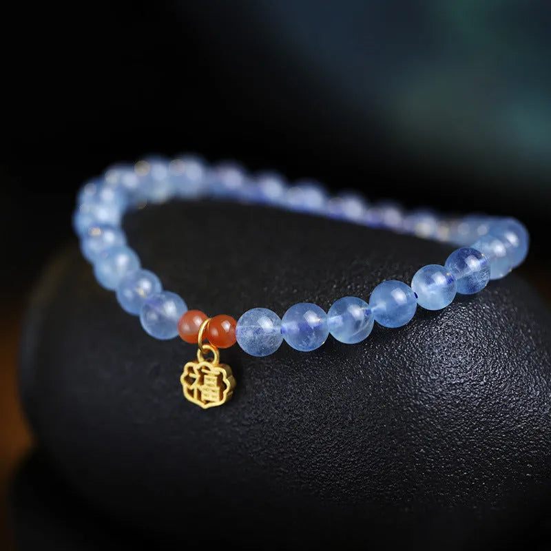 Icy translucent natural aquamarine crystal bracelet with 8mm round beads and a blessing card.