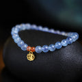 Icy translucent natural aquamarine crystal bracelet with 8mm round beads and a blessing card.