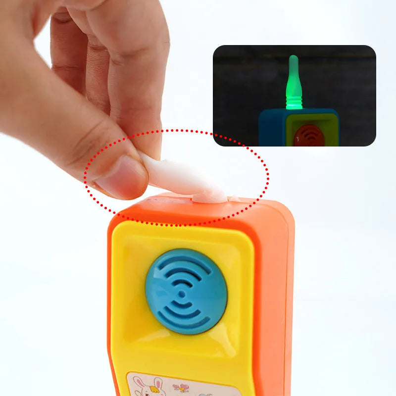 Children's educational toy with sound and light features showing cartoon animal design for age 3+