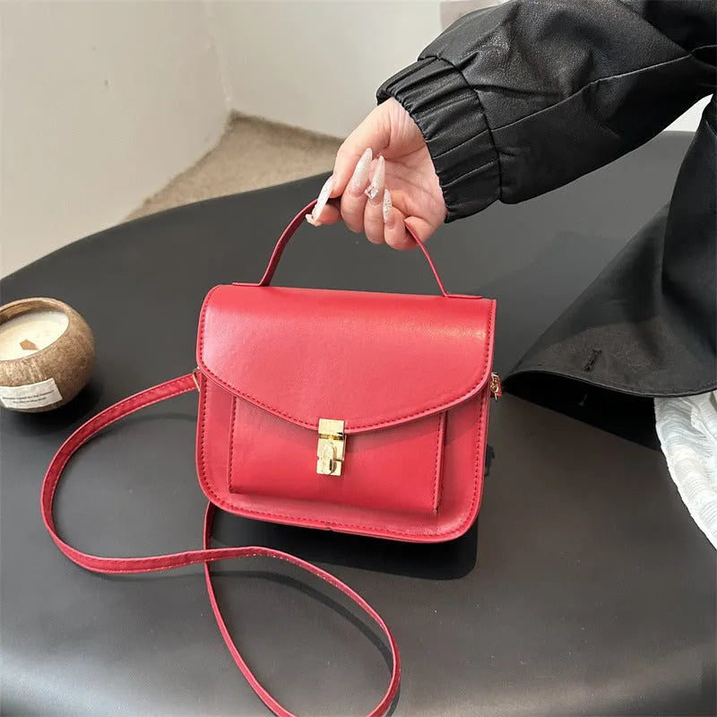 Retro style shoulder messenger bag in horizontal square shape with document compartment