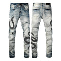 Close-up of wash distressed blue skinny jeans with a button fly and retro styling on a hanger.
