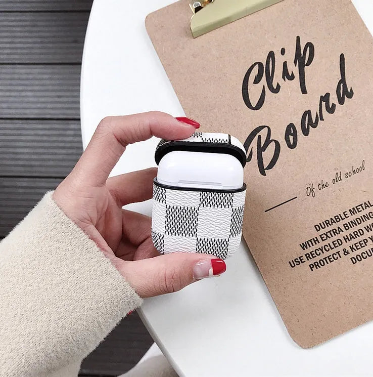 iPhone XS Max hard shell plastic case with grid pattern and integrated hook for Apple AirPods 2nd gen case.