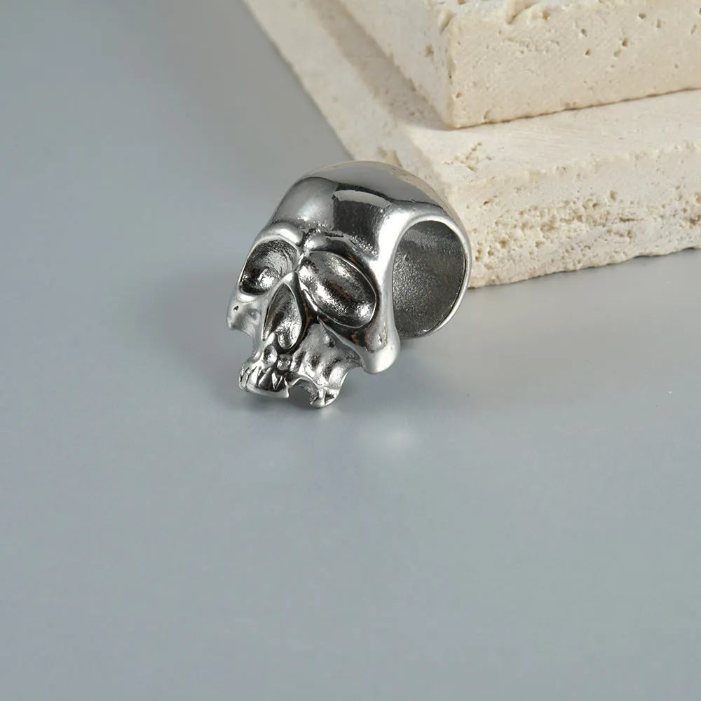 Stainless steel hollow skull Buddha geometric earrings with hip hop style