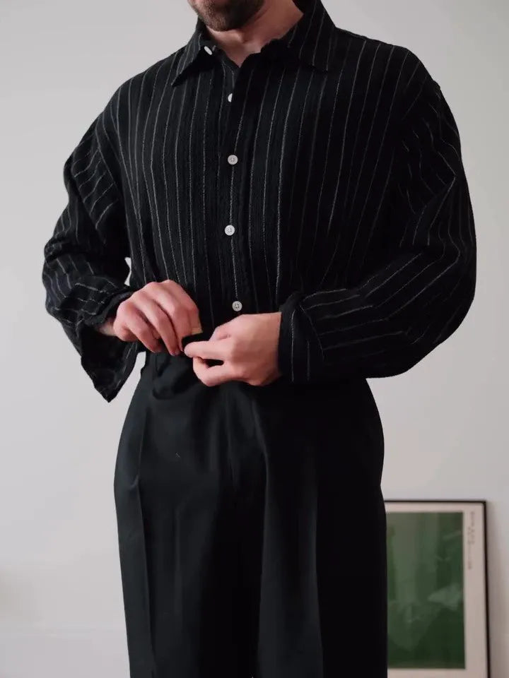 Black pinstriped button-down shirt with regular fit and long sleeves