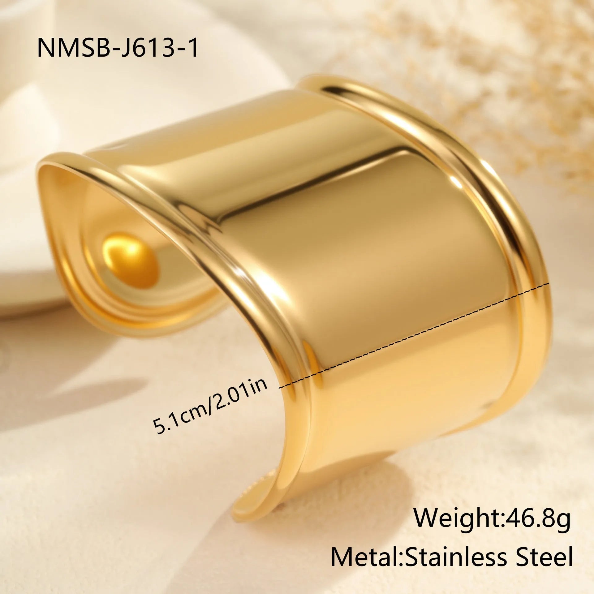 Women's gold-plated wide bracelet with stainless steel construction and geometric design