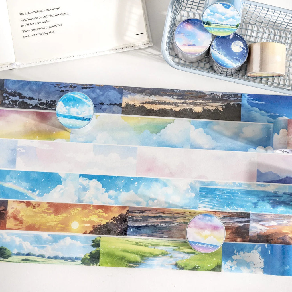 Japanese paper washi tape roll with celestial sky patterns including colourful clouds and twilight, 30mm width