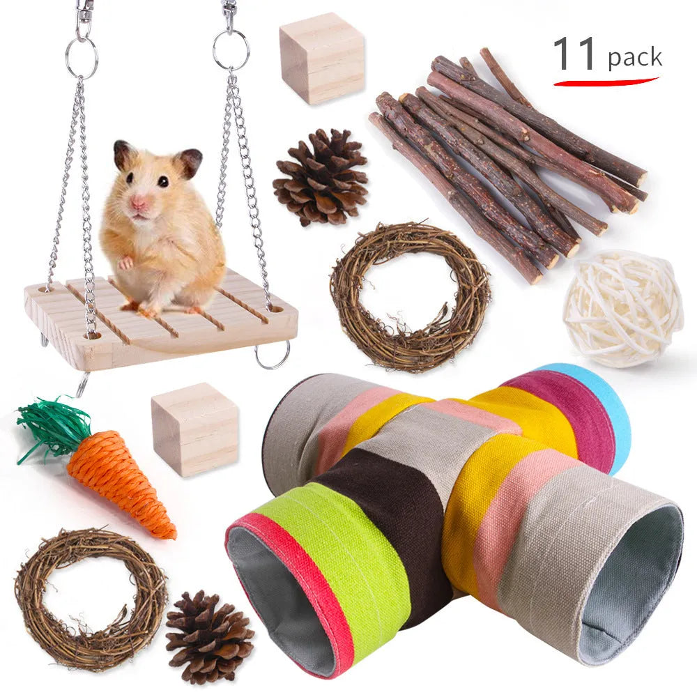 Assortment of natural wooden and woven chew toys for small pets like rabbits and parrots.