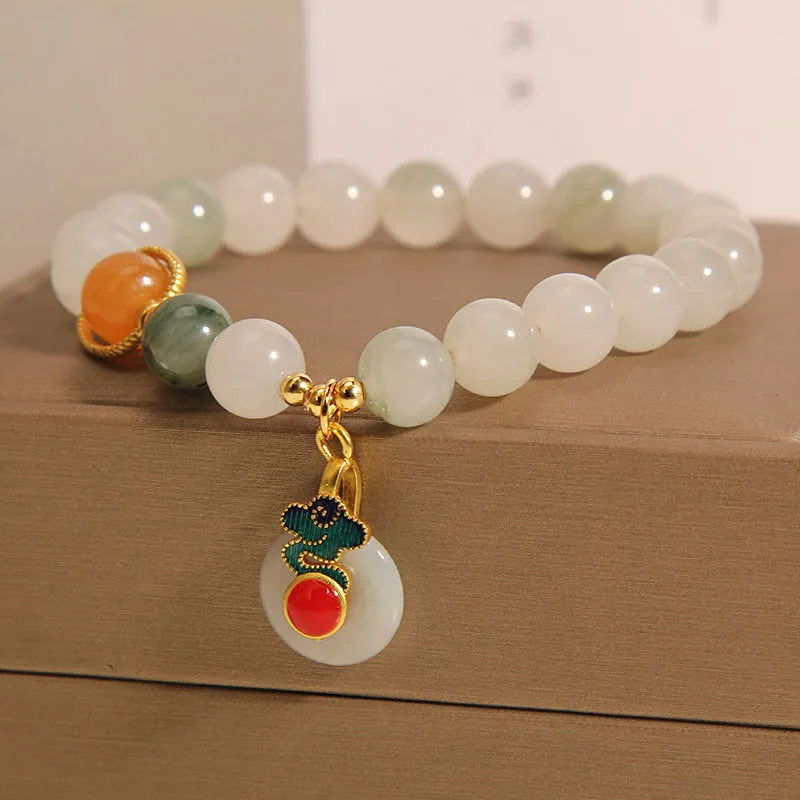 Ice jade bracelet with pearl decoration and Xiangyun peace buckle for women