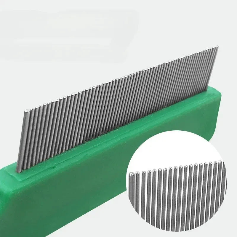 Green pet flea comb with stainless steel pins measuring 129mm for dog and cat grooming