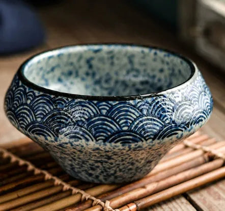 Ceramic Japanese soup bowl with stone conch shape and traditional Edo pattern design