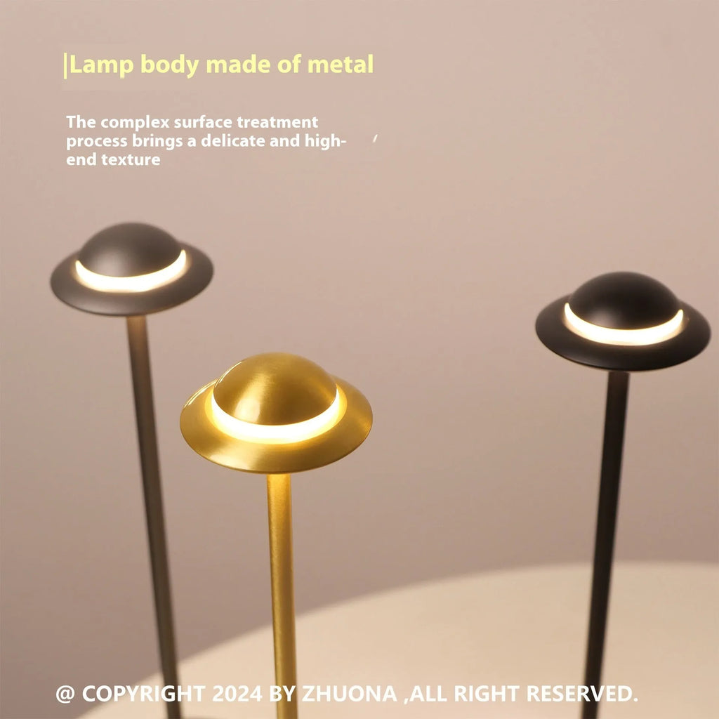Modern UFO-shaped metal table lamp in black, gold, or grey with touch dimming controls.