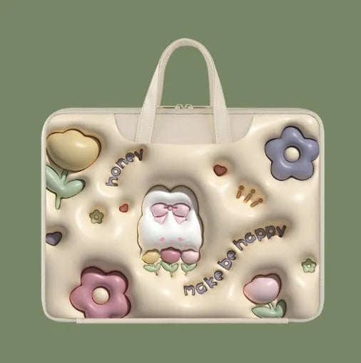 Inflatable grey laptop bag with a cute panda design, showing the inflation valve and back strap for attaching to suitcase handle.