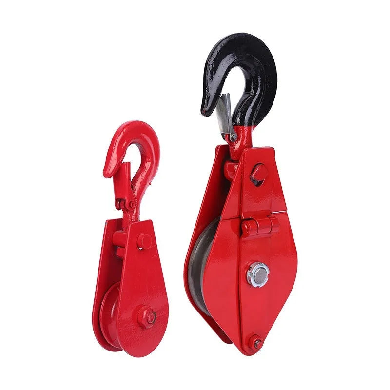 Red industrial lifting pulley with a forged steel safety hook and single wire rope wheel.