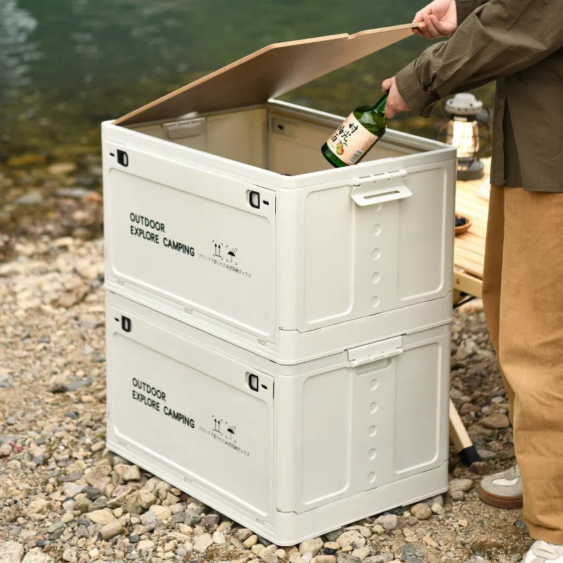 Large green foldable plastic storage box with a wooden lid on a white background.