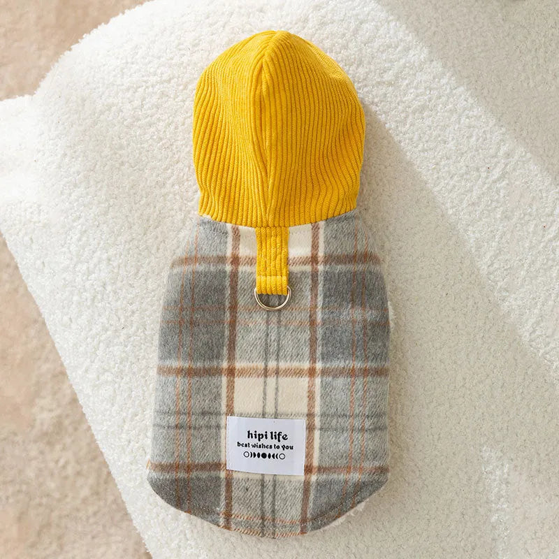Blue corduroy dog hooded vest with a chessboard grid pattern and traction detailing.