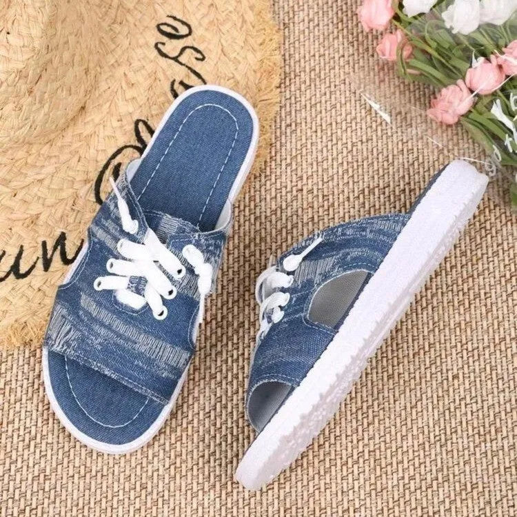 Blue Roman-style women's canvas slippers with cloth lining and rubber sole