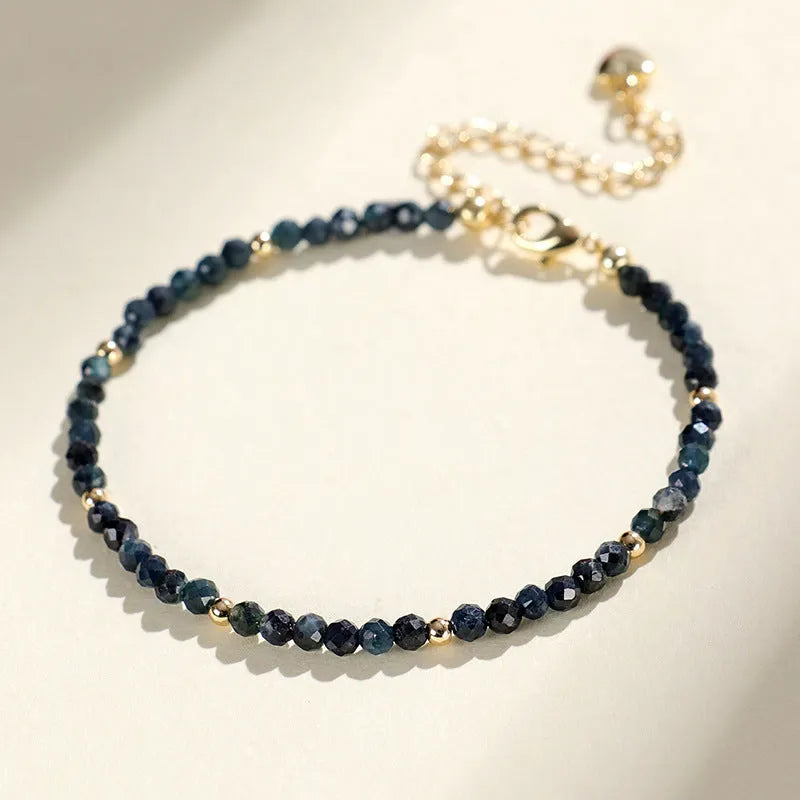 Blue tourmaline beaded bracelet with 3mm stones and silver spacer beads