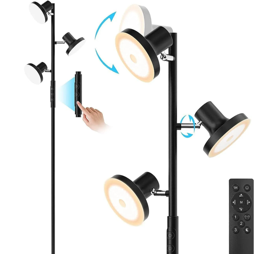 Black adjustable floor lamp with rotatable head and remote control in a living room
