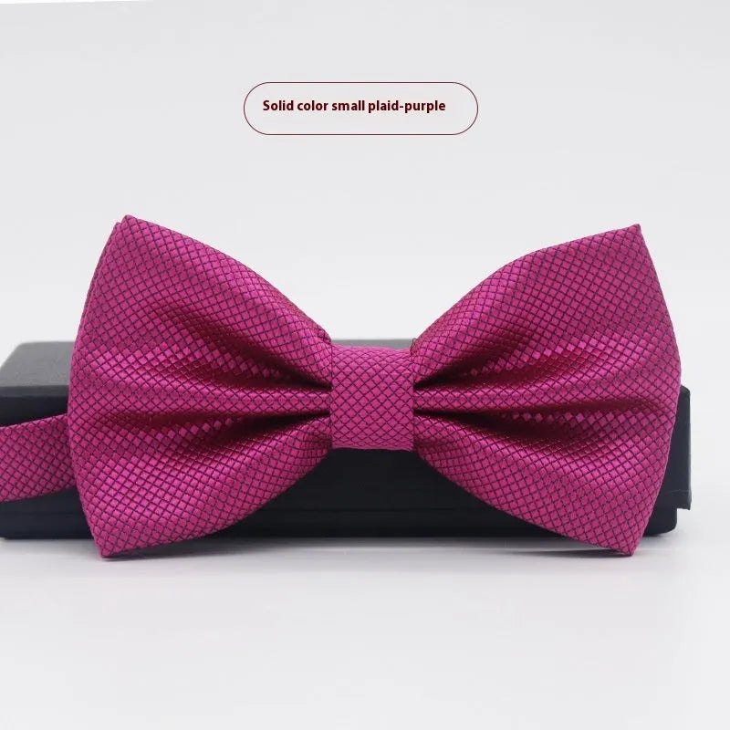 Solid colour flat head bow tie for formal wear in multiple colours including black, red, and blue.