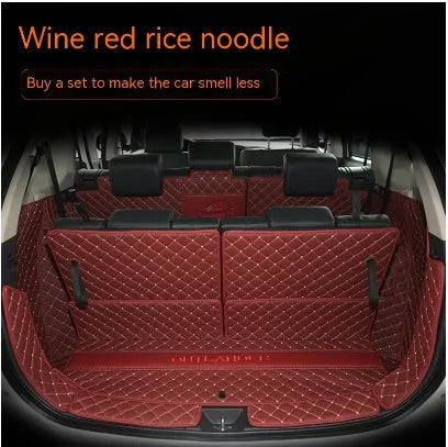 Mitsubishi Outlander 3D boot liner with high edges in a wine red colour with contrasting beige lines.