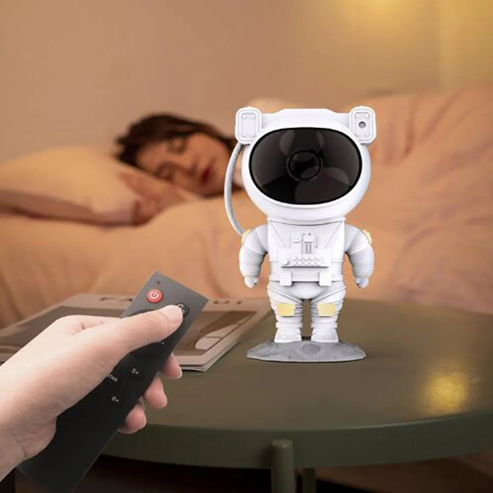 Creative astronaut galaxy starry sky projector nightlight on table with remote control, black finish
