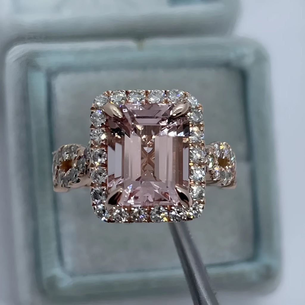 Rose gold electroplated alloy ring with geometric shape on white background