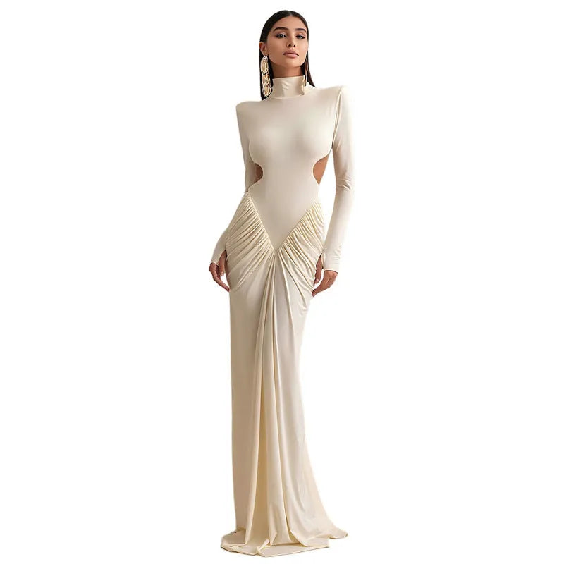 Women's slim fit long sleeve dress with high collar and pleated backless detail in light apricot colour