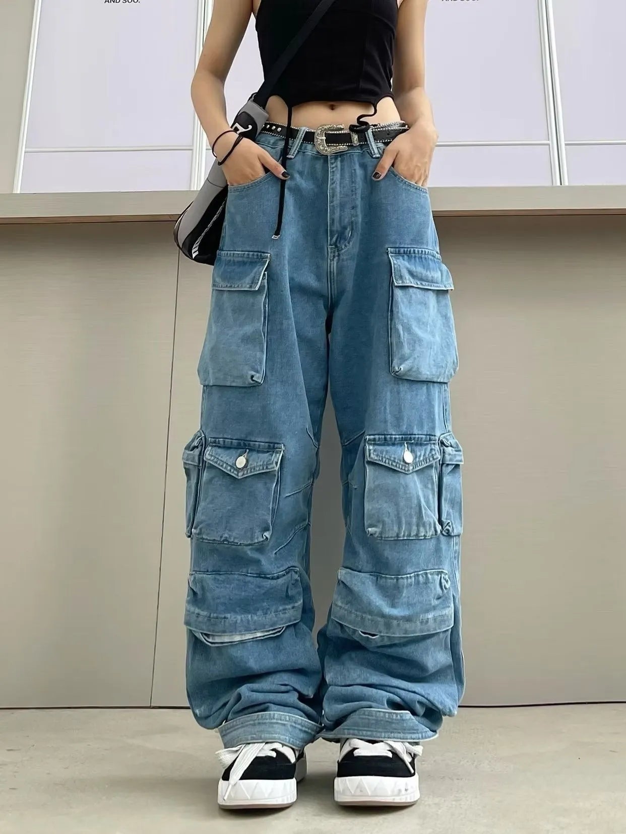 Women's high waist wide leg jeans in tie-dyed denim with multi-pocket street hipster styling