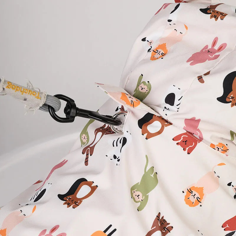 Beige cartoon print dog raincoat with double waterproof PU coating.