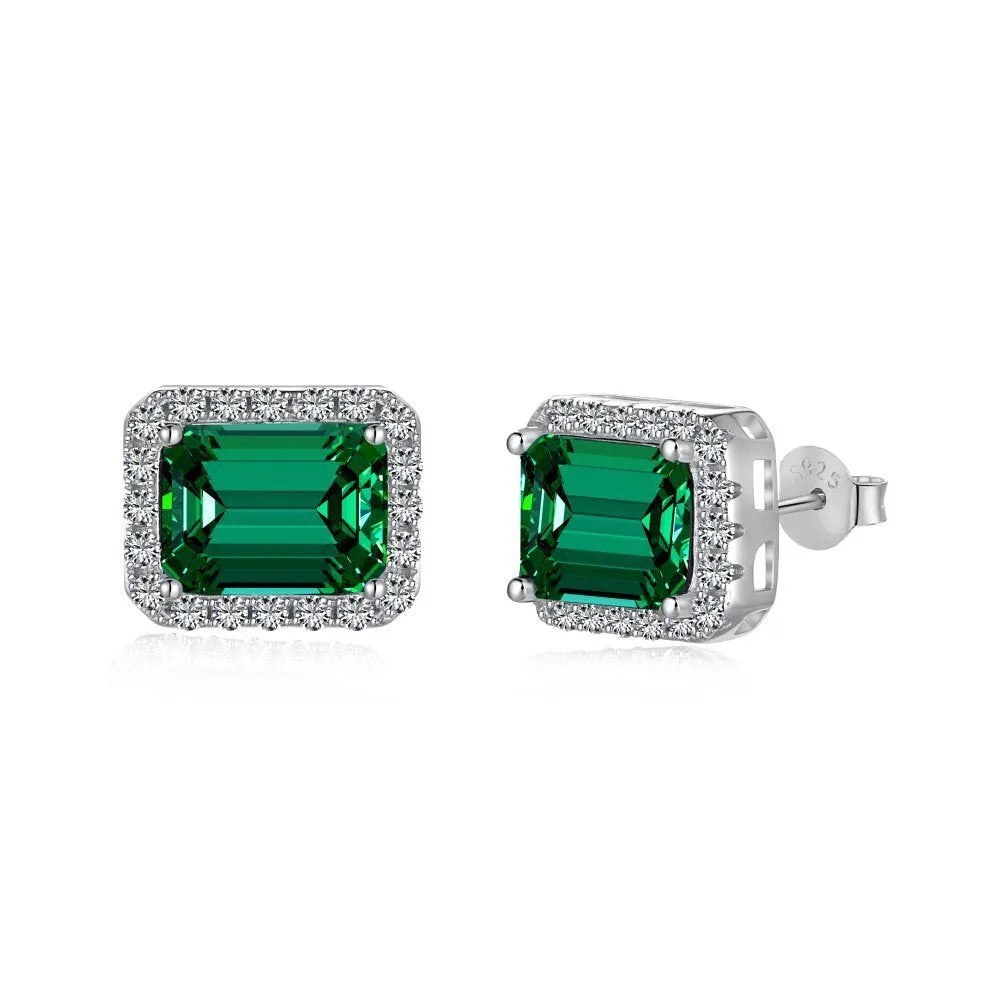 Diamond and emerald symmetry stud earrings in platinum 925 silver 8.5 x 10.5mm