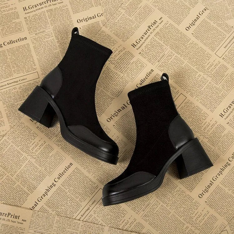 Black women's chunky heel martin boots with thick rubber sole and lace-up design