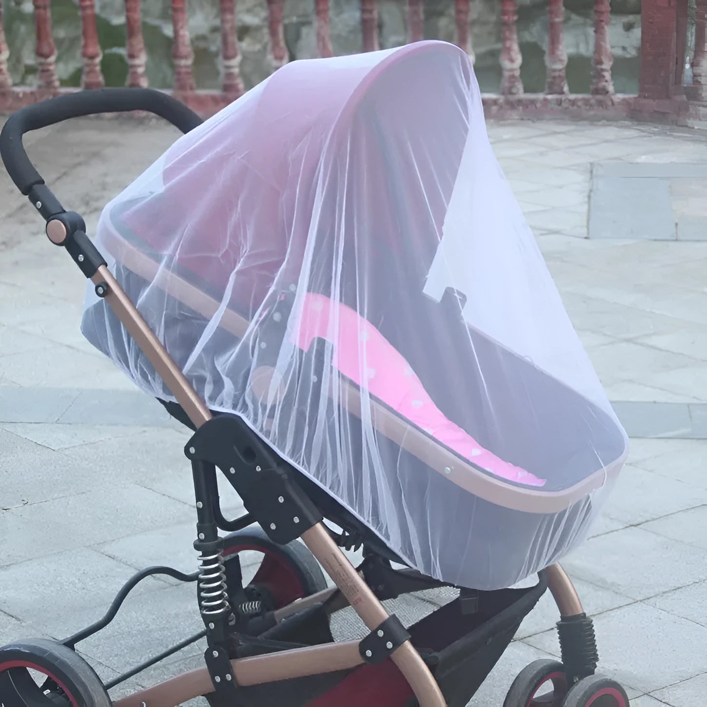 Baby stroller mosquito net full cover in black fine mesh on a pram for summer protection