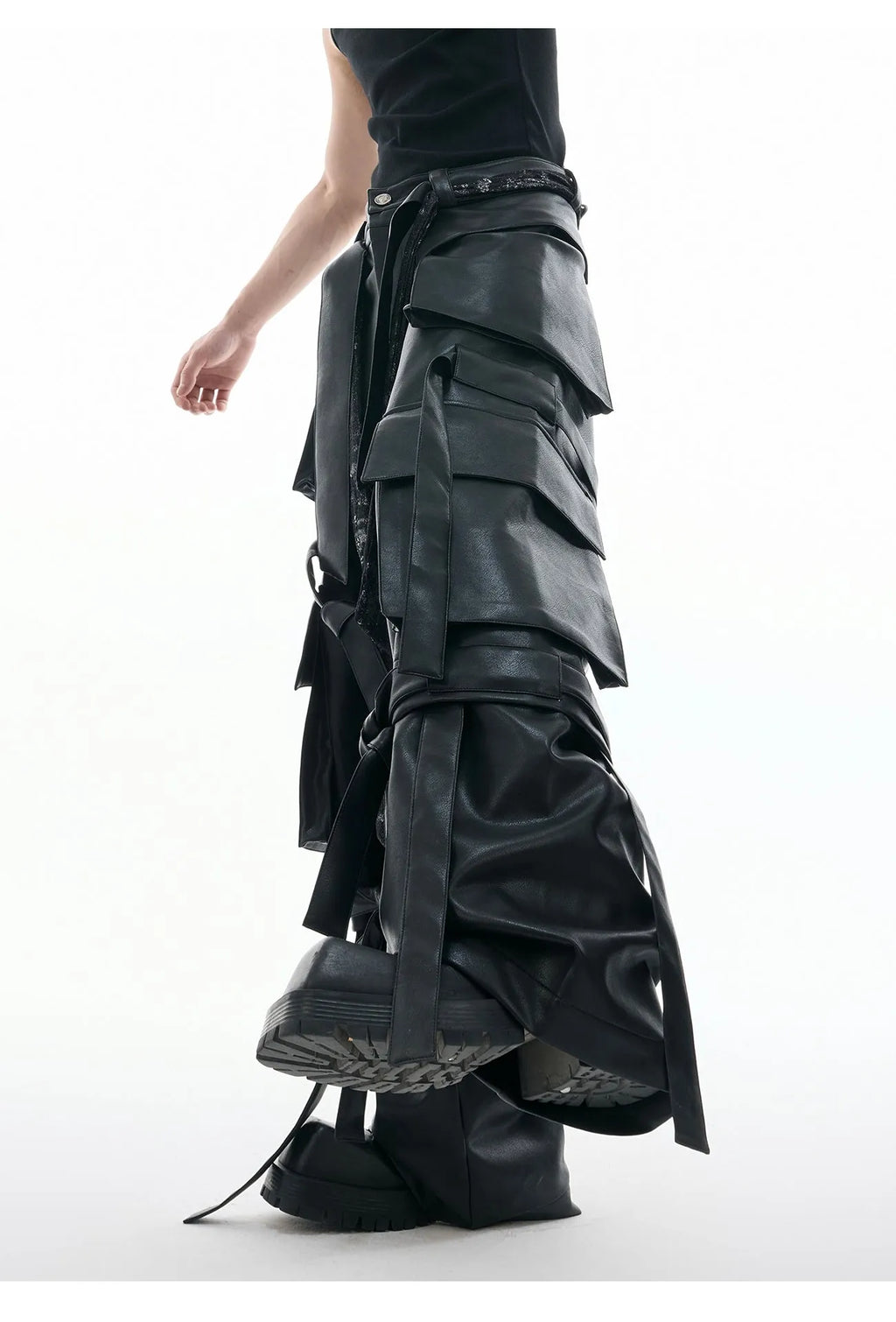 Black quilted leather trousers with multiple pockets and retro stitching details