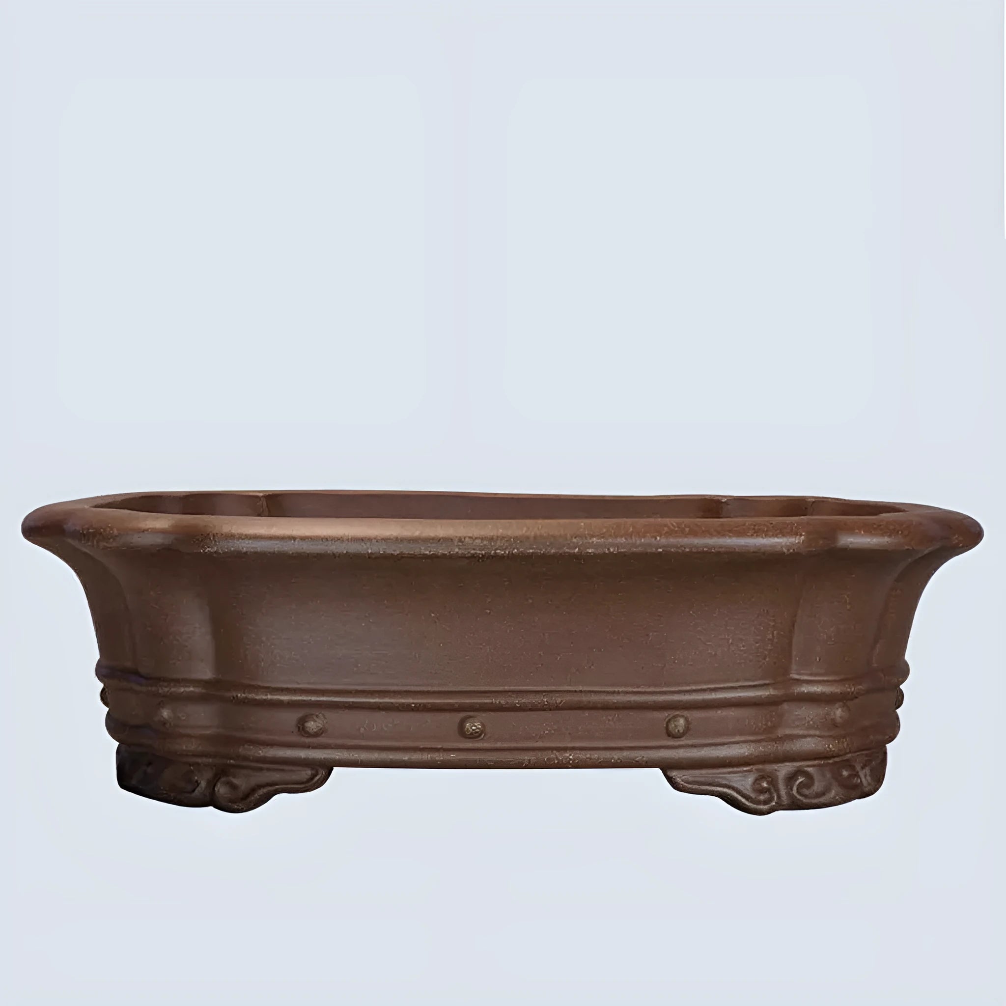 Handmade purple clay rectangular flower pot with antique finish on desktop