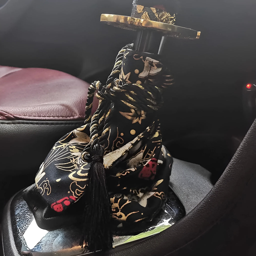 Canvas gear knob cover in peony phoenix pattern on a car gear stick, universal fit