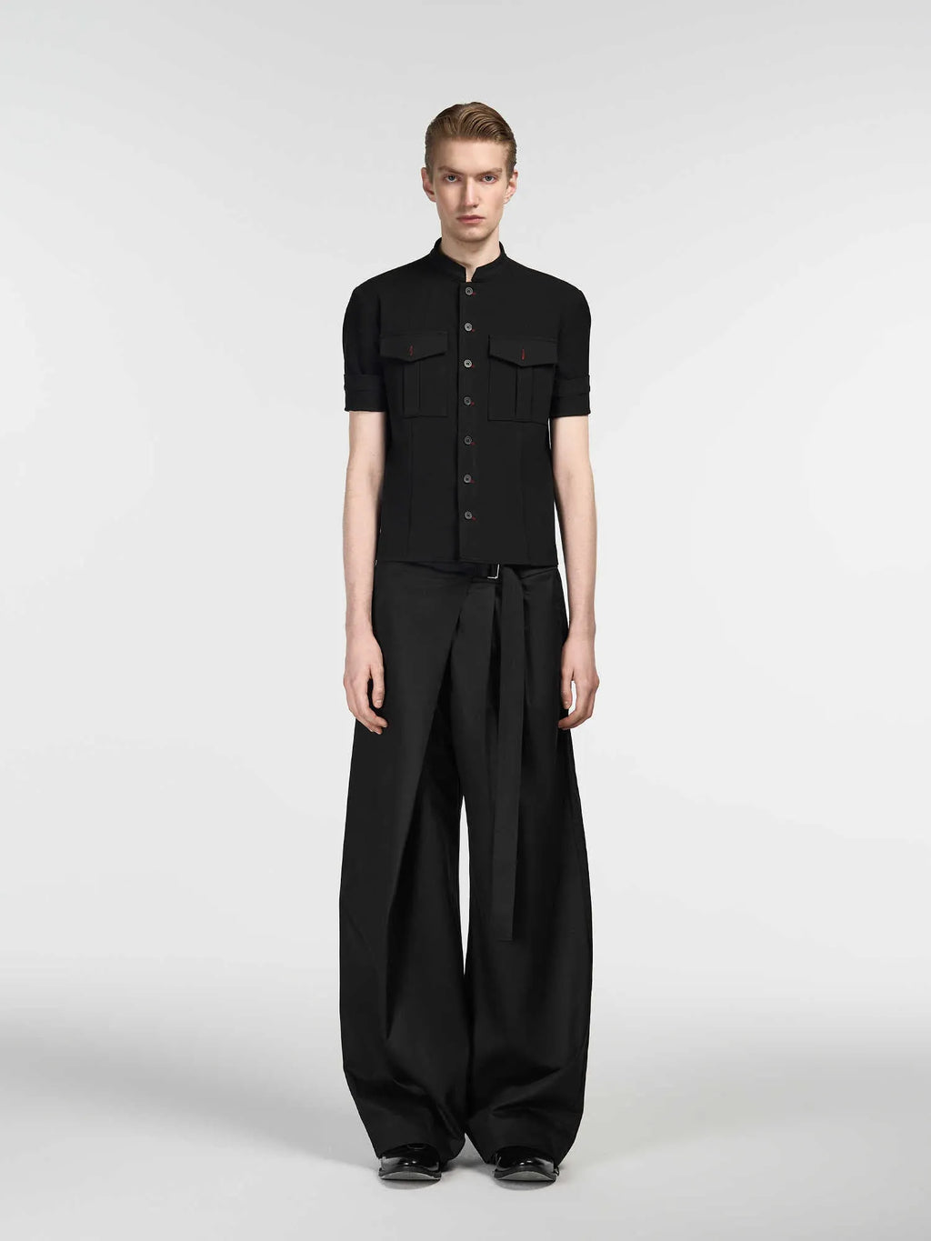 Black straight-leg trousers with single pleated cut and adjustable waist