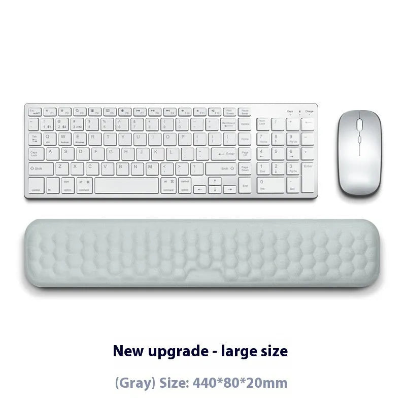 Memory foam mouse wrist rest with silicone base in black cloth and grey leather style options.
