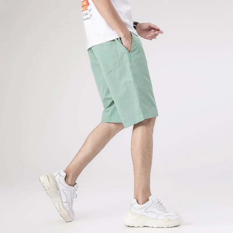 Men's polyester five-point shorts in army green, straight leg, mid-waist