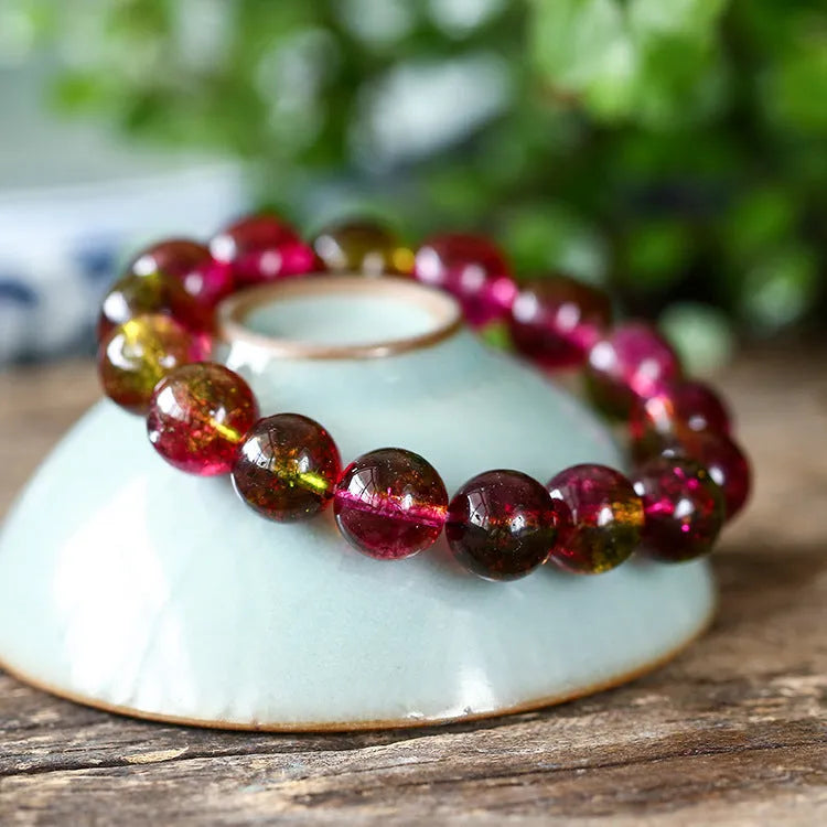 Women's watermelon crystal bracelet in pastel colours showing four size options from 6mm to 12mm diameter