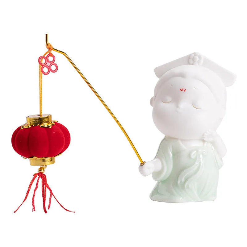 Ceramic cute female court attendant figurine incense burner decoration on a surface.