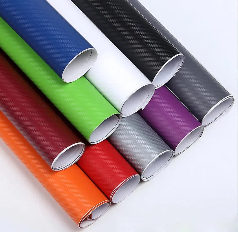 Roll of 3D carbon fibre car stickers showing textured pattern in multiple colour options