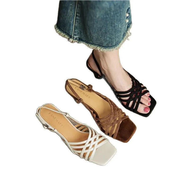 Women's light brown retro sandals with thin cross ankle straps and a square toe on a mid-height heel.