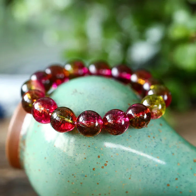Women's watermelon crystal bracelet in pastel colours showing four size options from 6mm to 12mm diameter