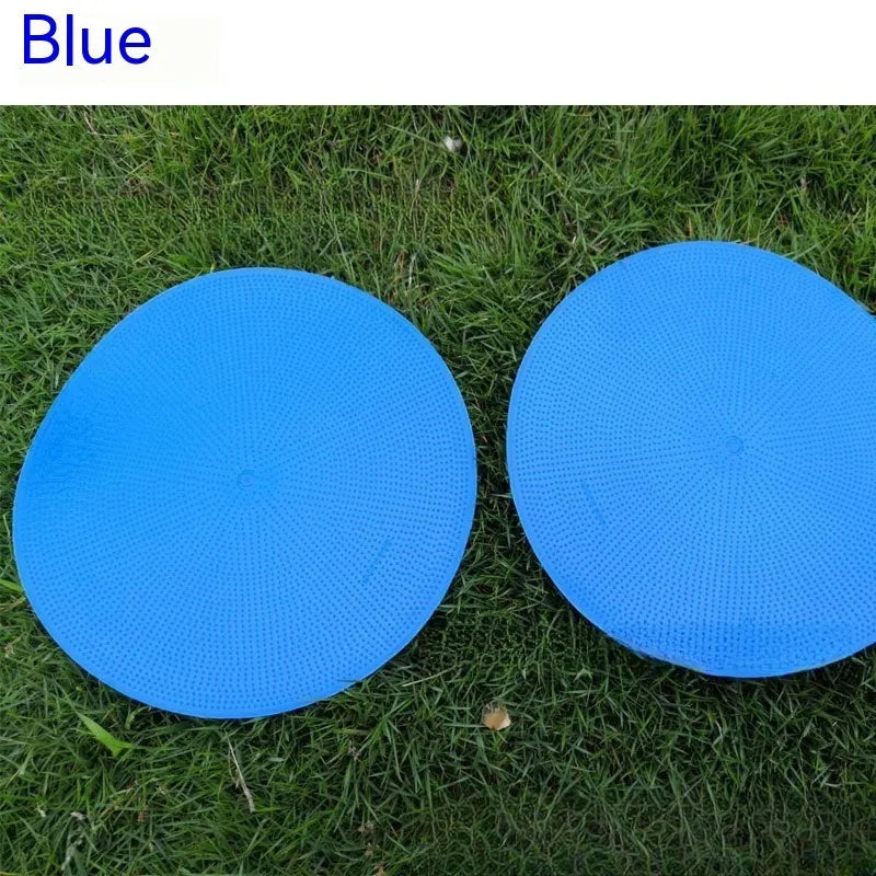 Soft yellow football landmark pad disc on grass, 23cm diameter, for training targets.
