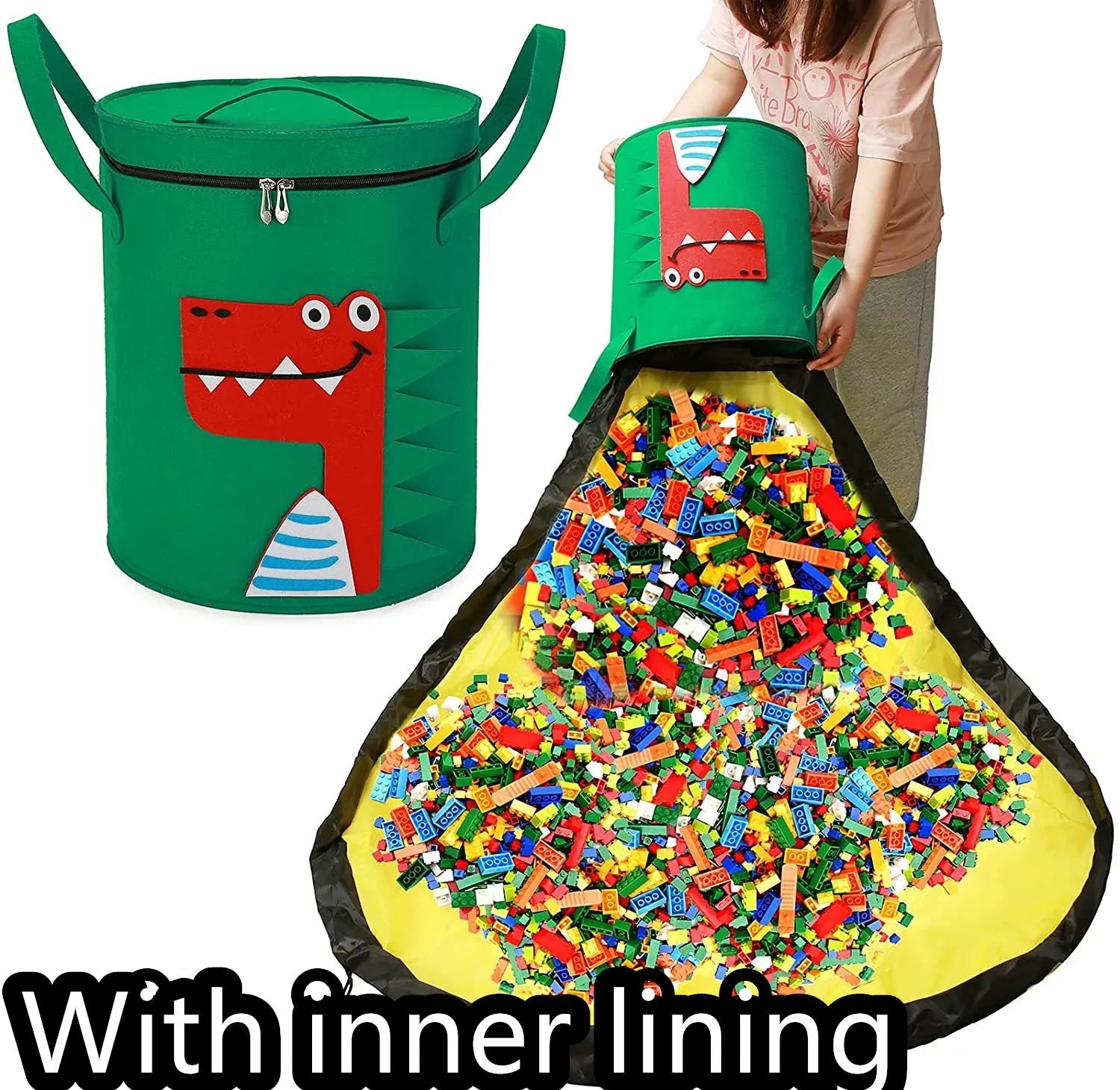 Green felt cube storage bag with pull rope, laid flat as a play mat for toys.