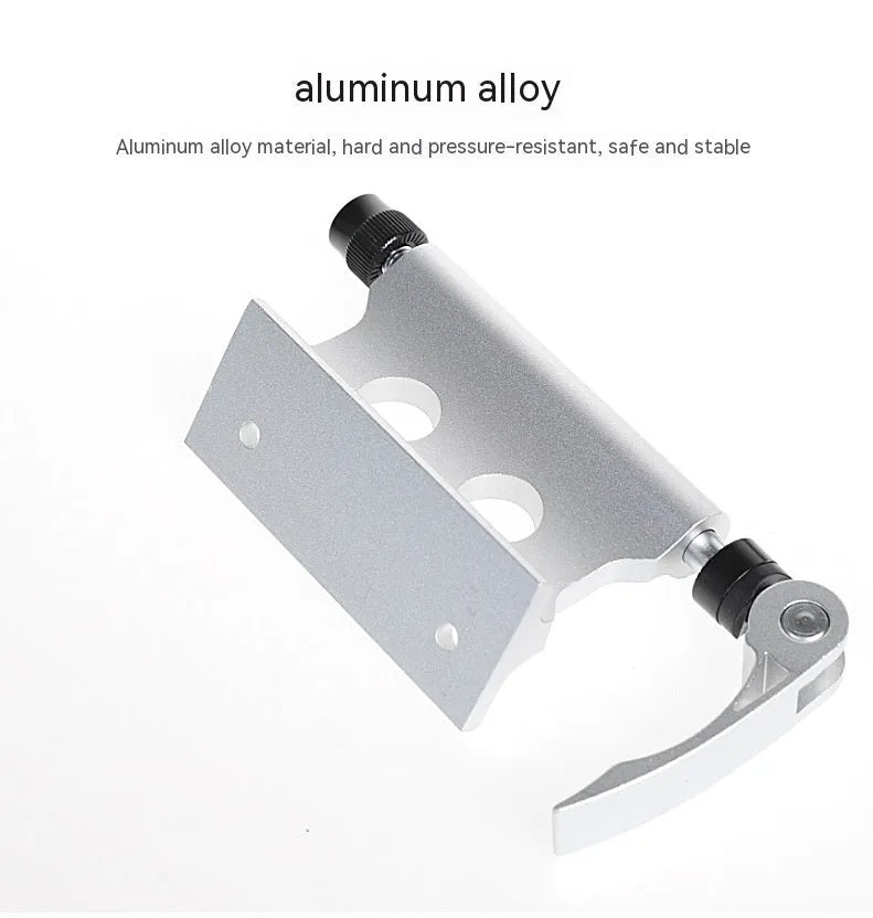 Silver metal bicycle front fork quick release fixing clamp for accessory mounting