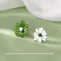 Alloy flower stud earrings in blue and orange, yellow and white, or white and green colour options