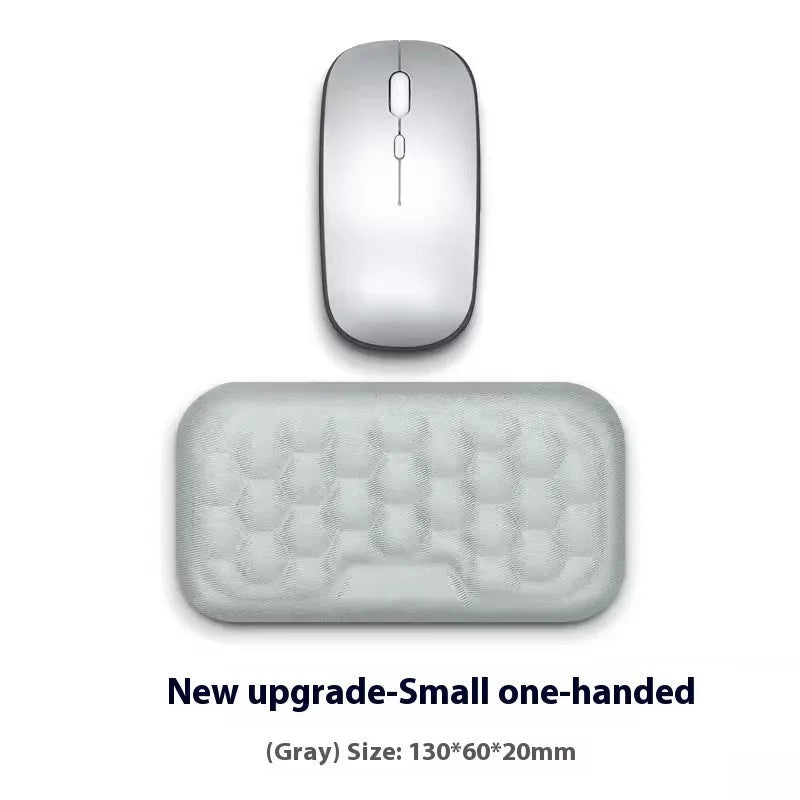 Memory foam mouse wrist rest with silicone base in black cloth and grey leather style options.