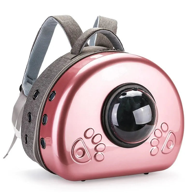 Transparent space capsule style cat carrier bag with breathable design and rose gold front cover.