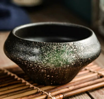 Ceramic Japanese soup bowl with stone conch shape and traditional Edo pattern design